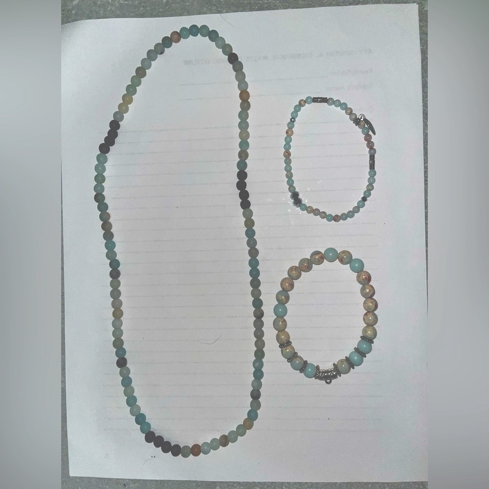 Two bracelet and necklace set